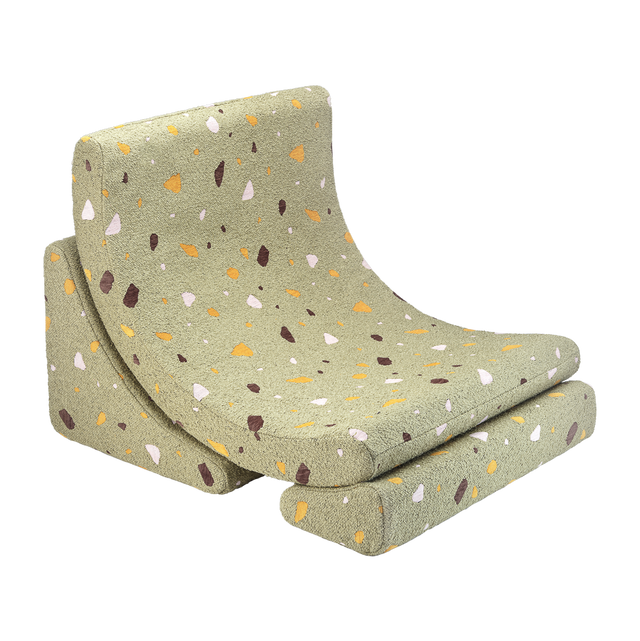 Sillón infantil tejido terrazo Luna con acabado verde, tejido en ambiente de estilo nórdico
